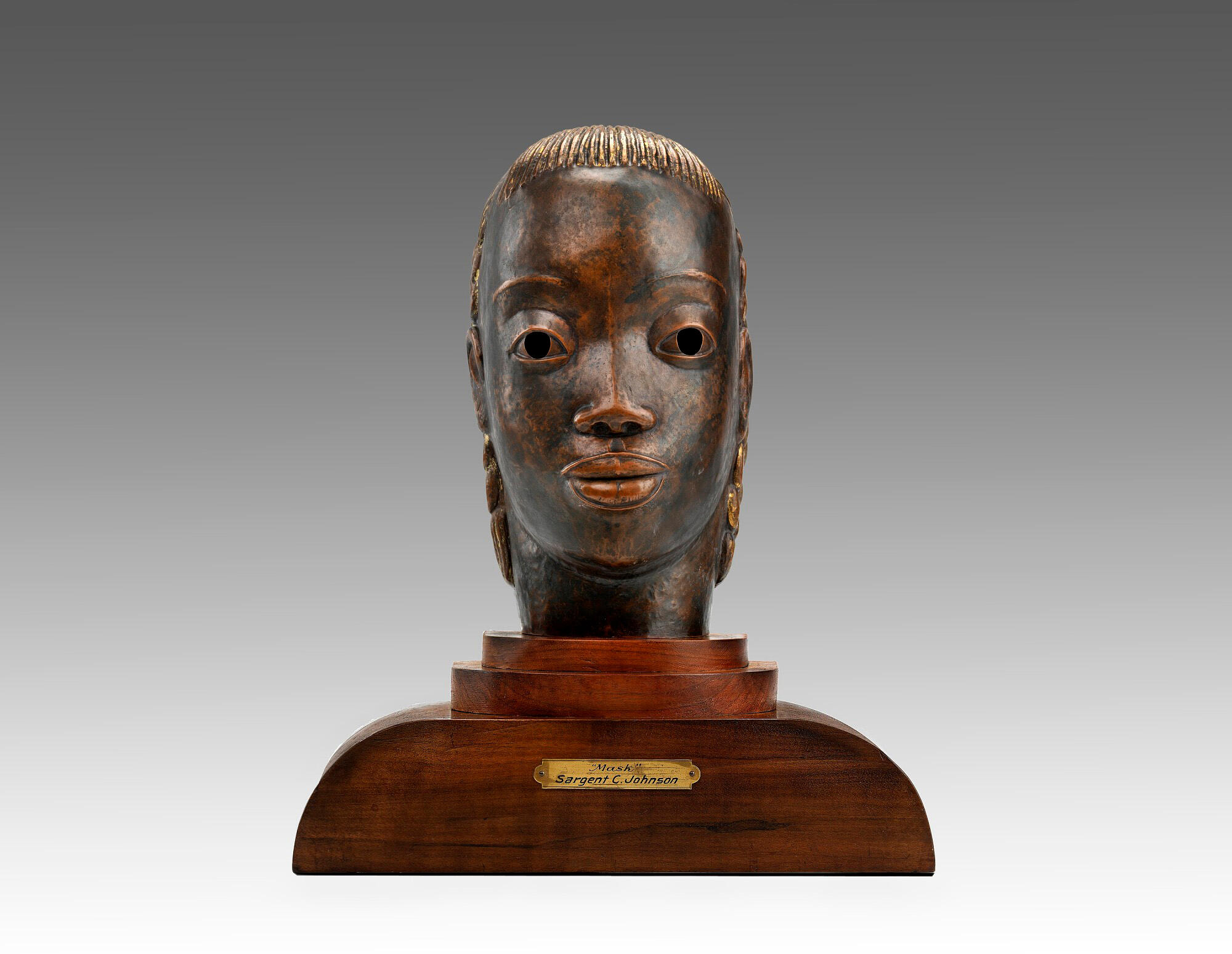 Mask, ca. 1930-1935. Copper on wood base, 15 1/2 x 13 1/2 x 6 in. (39.4 x 34.3 x 15.3 cm). Gift of International Business Machines Corporation (1966.27.4).